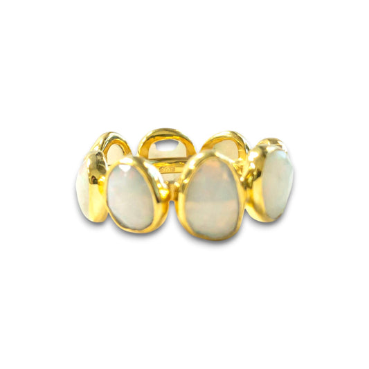 18K yellow gold eternity band ring with oval opals.