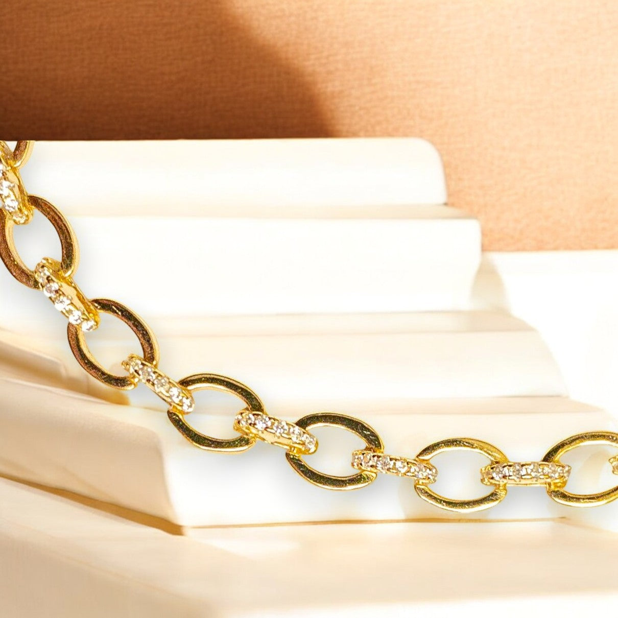 18K gold-plated oval link bracelet with cubic zirconia stones and lobster clasp